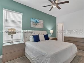 bedroom featuring ceiling fan