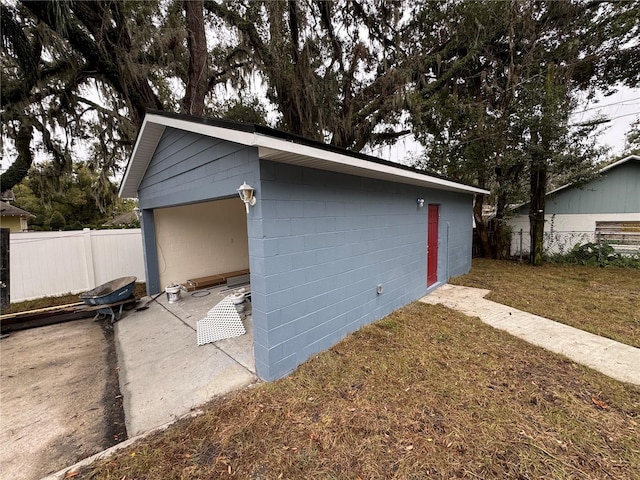 garage with a yard