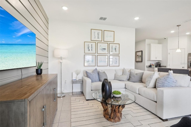 living room featuring light tile patterned flooring