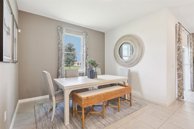 dining room with light tile patterned floors