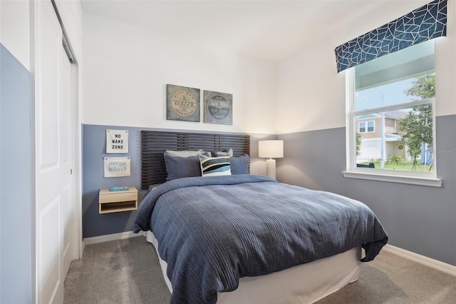 bedroom featuring a closet and carpet