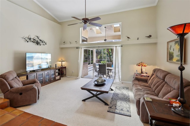 living room with ceiling fan, carpet, ornamental molding, and high vaulted ceiling