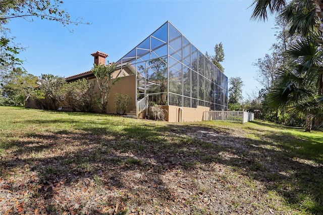 view of yard with a lanai