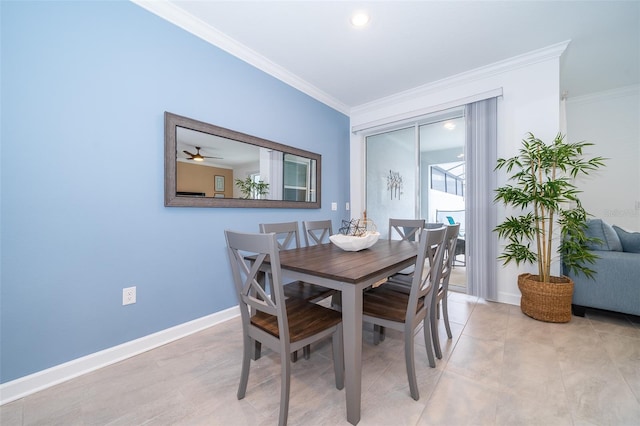 dining room featuring crown molding