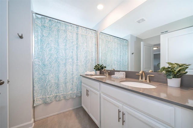 bathroom featuring shower / bath combination with curtain and vanity