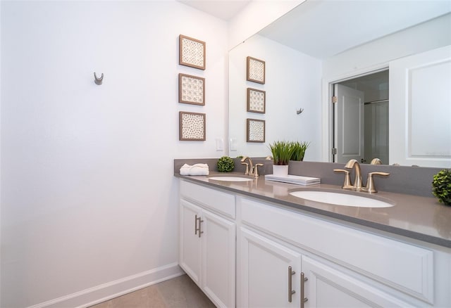 bathroom featuring tile patterned floors and vanity