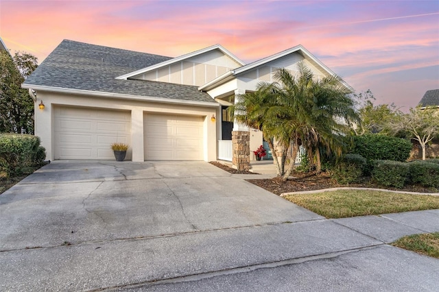 view of front of property with a garage