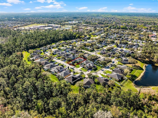 bird's eye view with a residential view and a water view