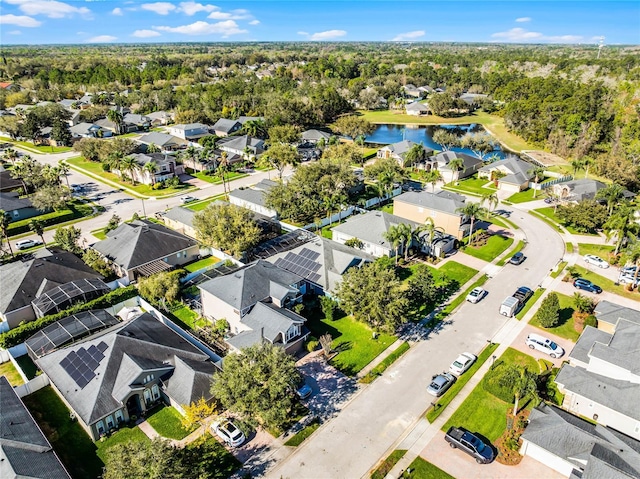 aerial view featuring a water view and a residential view