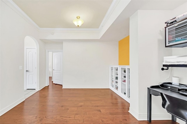 kitchen featuring crown molding and wood-type flooring