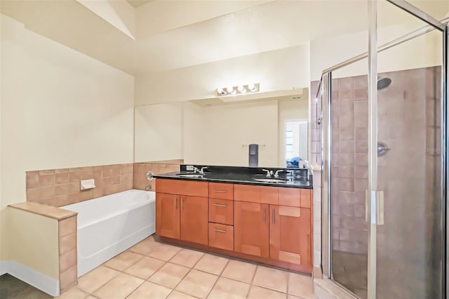 bathroom featuring tile patterned flooring, vanity, and independent shower and bath