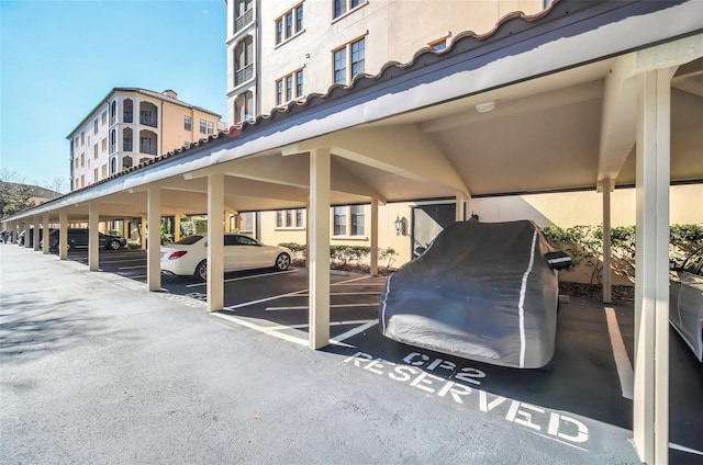 view of parking featuring a carport