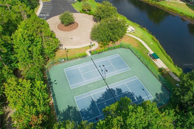 birds eye view of property featuring a water view