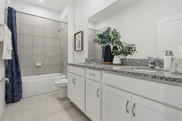 full bathroom with vanity, toilet, shower / bath combo, and tile patterned flooring