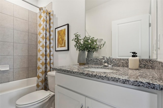 full bathroom with shower / bath combo with shower curtain, toilet, and vanity