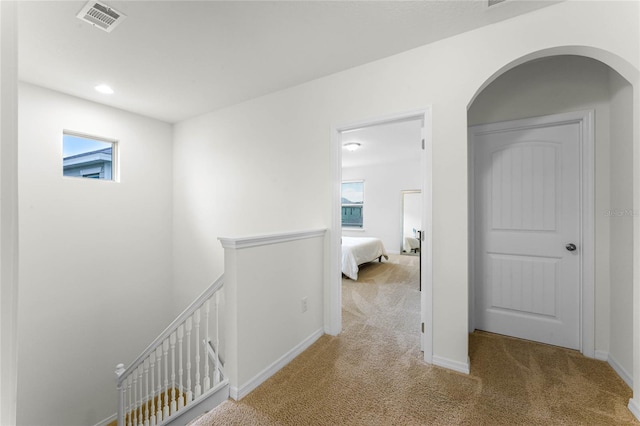 hallway featuring carpet floors