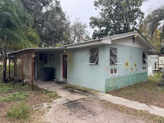 view of front facade featuring a carport