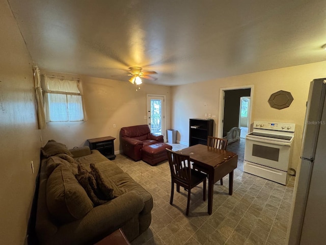 living room featuring ceiling fan