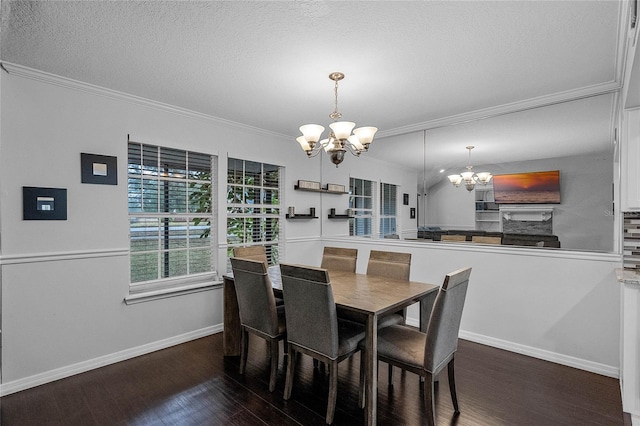 dining space with ornamental molding, dark hardwood / wood-style flooring, and a notable chandelier