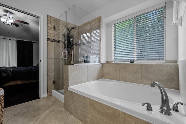 bathroom with tile patterned flooring, plus walk in shower, and ceiling fan