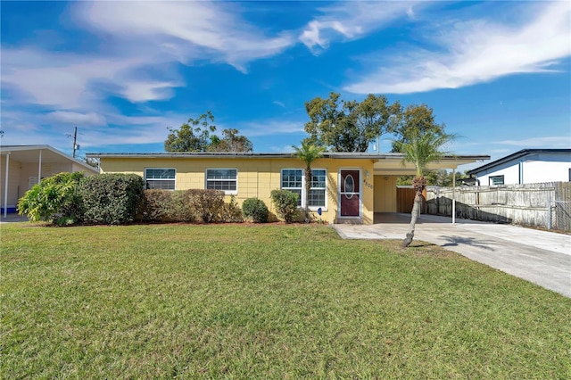 single story home featuring a front yard and a carport