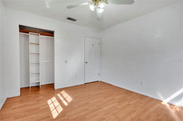 unfurnished bedroom with light wood-type flooring and ceiling fan