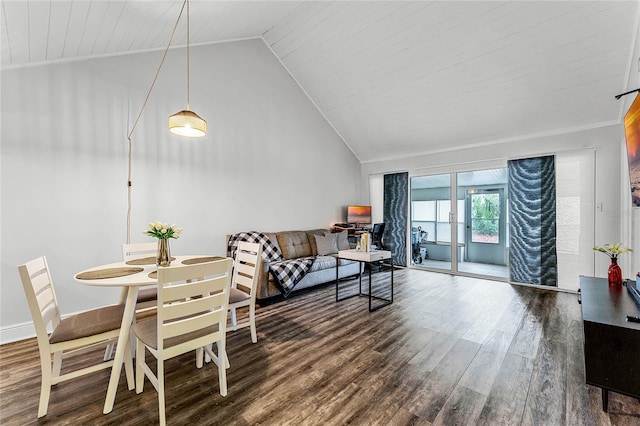 living room featuring dark hardwood / wood-style floors and lofted ceiling