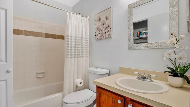 full bathroom featuring toilet, vanity, and shower / bath combo