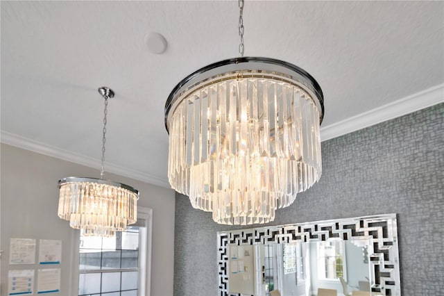 interior details featuring ornamental molding and a chandelier