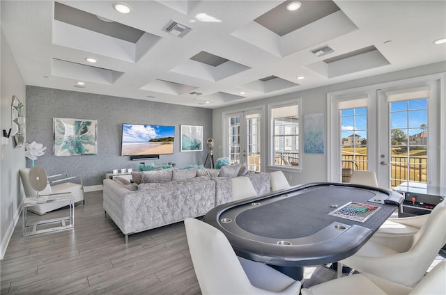 game room with coffered ceiling, hardwood / wood-style flooring, and french doors