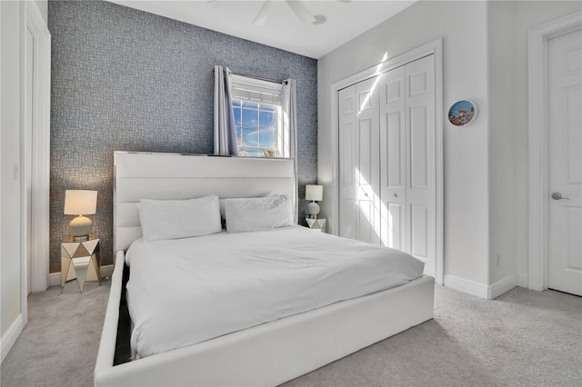 carpeted bedroom with a closet