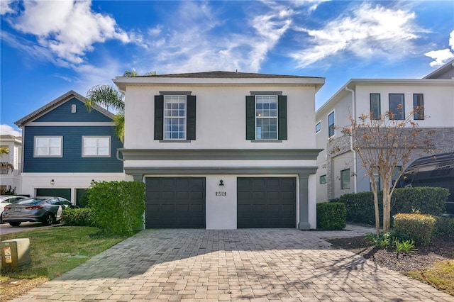 view of front of property featuring a garage