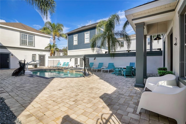 view of pool with a patio