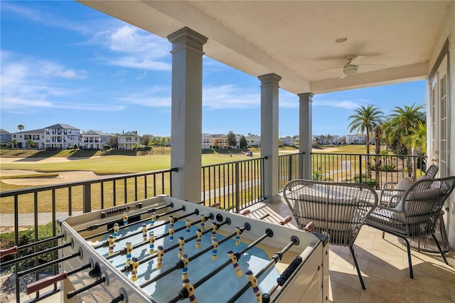 view of patio / terrace featuring ceiling fan