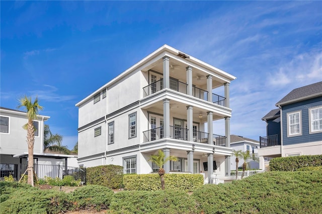 view of front of property with a balcony