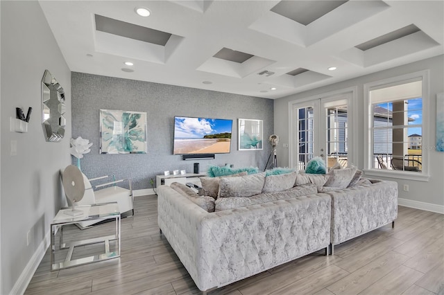 living room with french doors, wood-type flooring, and coffered ceiling