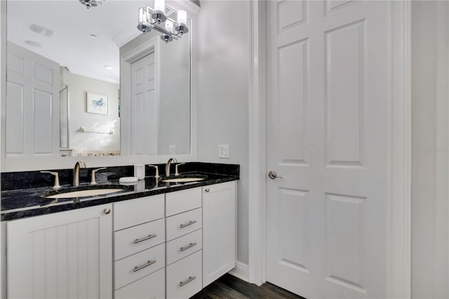 bathroom featuring vanity and hardwood / wood-style floors