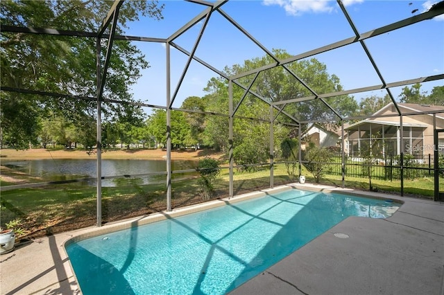 view of pool with a water view, glass enclosure, and a patio area