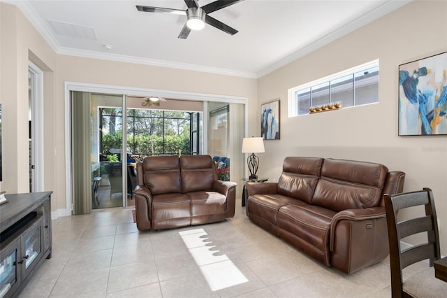 tiled living room featuring ornamental molding and ceiling fan