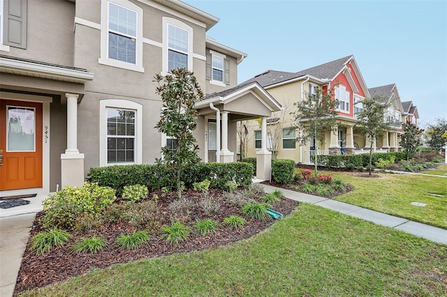 view of front facade with a front yard