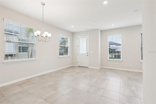 interior space featuring a notable chandelier