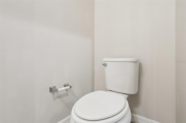 bathroom featuring toilet