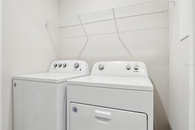 laundry room with washer and clothes dryer