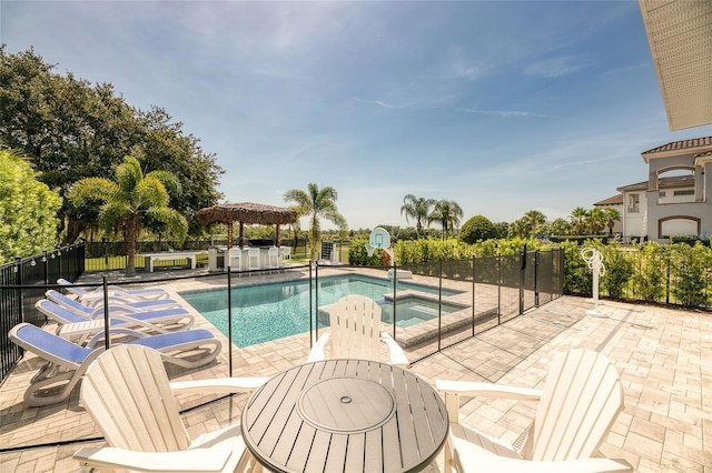 view of swimming pool featuring a patio area and a gazebo