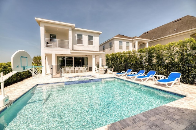 view of pool featuring a patio