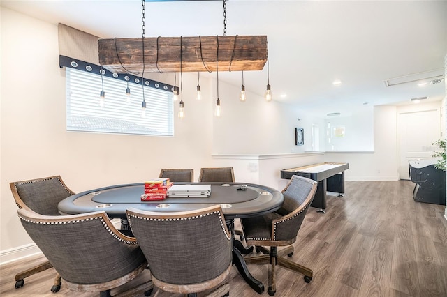 dining room with wood-type flooring