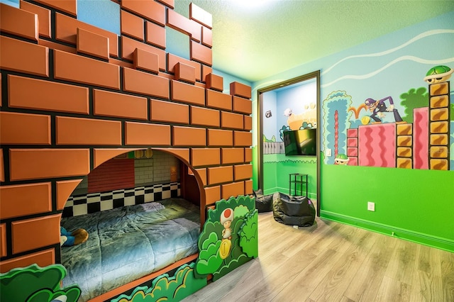 bedroom featuring light hardwood / wood-style floors