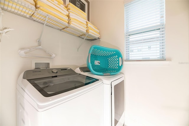 washroom featuring independent washer and dryer