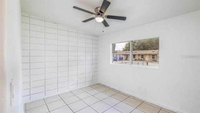 empty room featuring ceiling fan