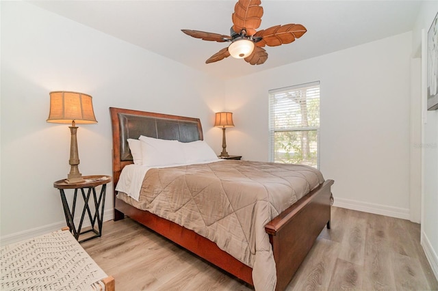 bedroom featuring ceiling fan and light wood-type flooring